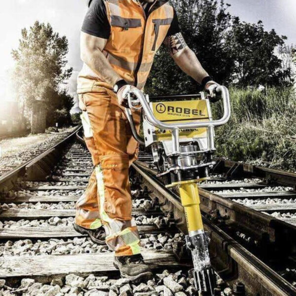 photo of a worker using the Robel Battery Powered Vertical Tamper - RoTamp 62.20 E3 Light