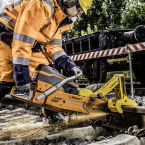 photo of a man using the Robel Husqvarna K1270 Rail Saw - RoCut 13.70