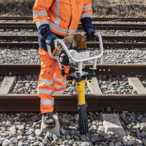 photo of man using the Robel Gas Tie Tamper RoTamp 62.05