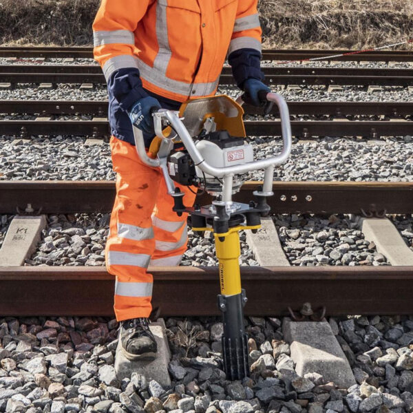 photo of man using the Robel Gas Tie Tamper RoTamp 62.05